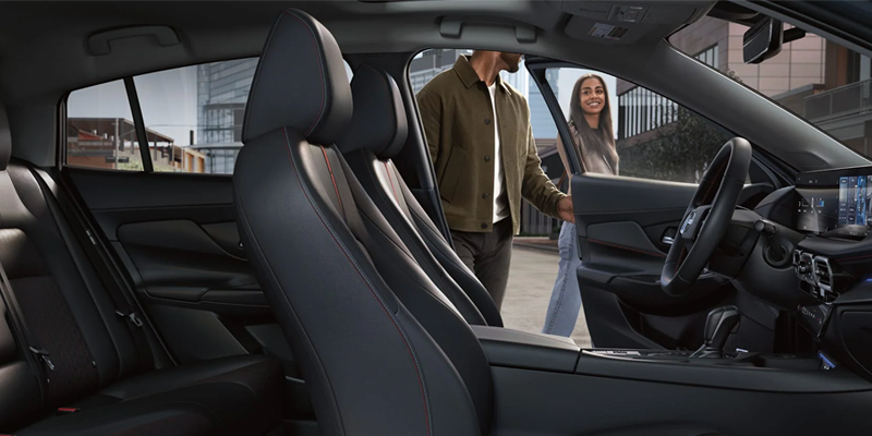 Nissan Sentra interior with modern seats and dashboard.