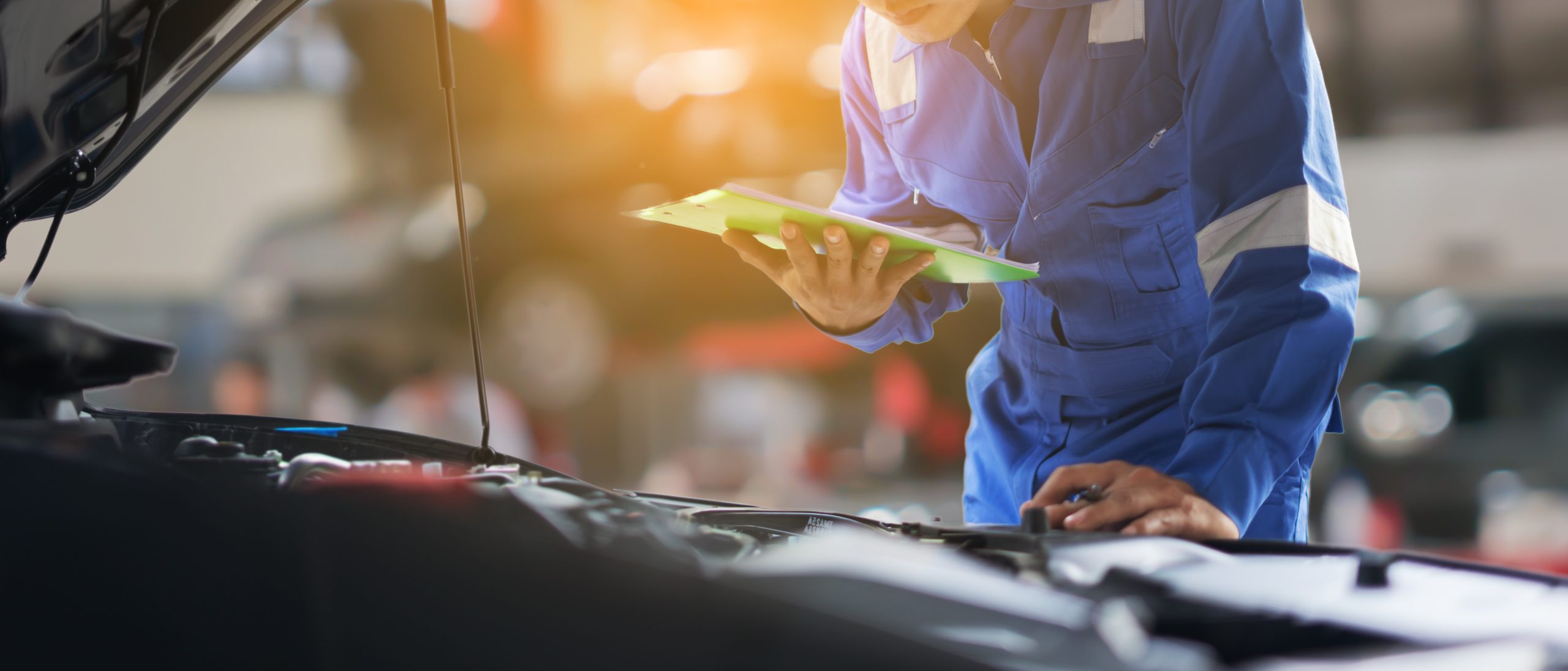 Car service inspection by mechanic