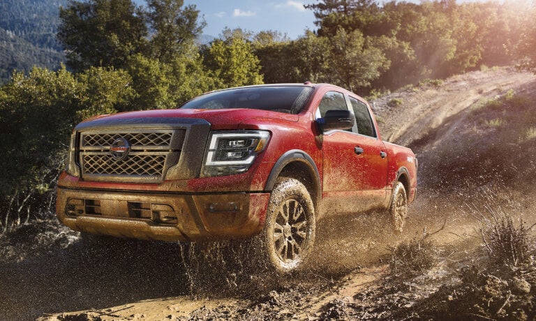2021 Nissan Titan driving in dirt