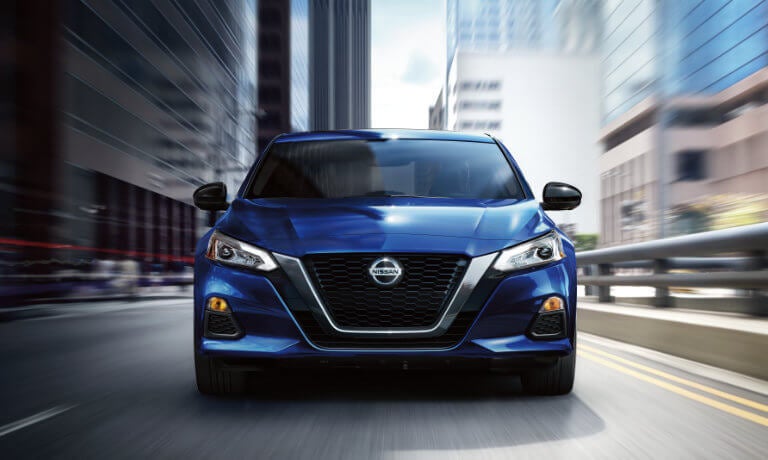 2025 Nissan Altima driving head-on in city
