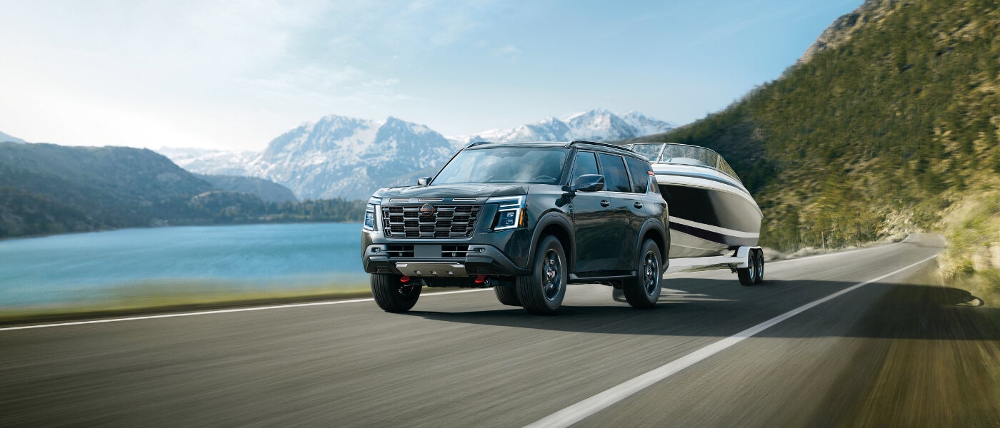 2025 Nissan Armada towing a boat