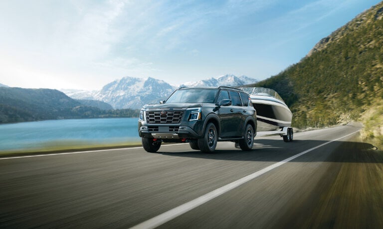 2025 Nissan Armada towing a boat