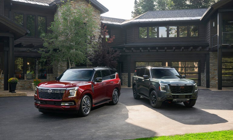 2025 Nissan Armada pair parked outside house