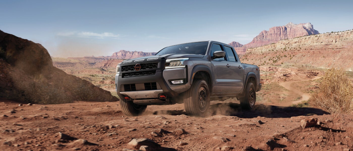 2025 Nissan Frontier driving in the desert