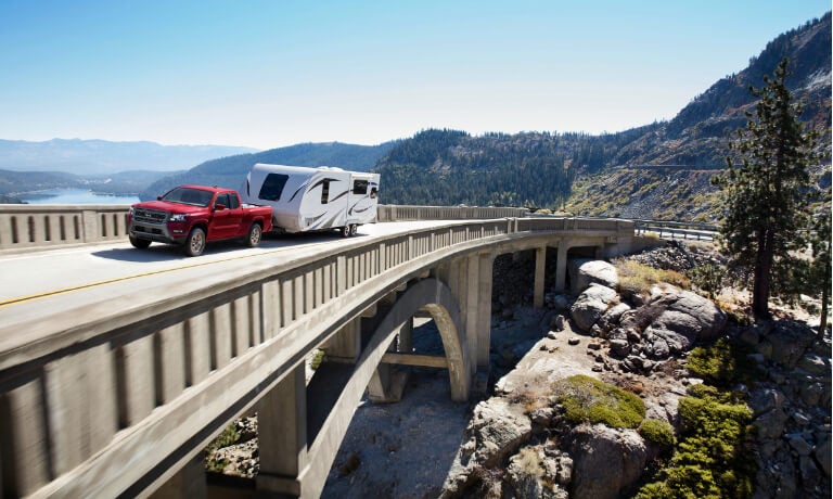 2025 Nissan Frontier towing an RV